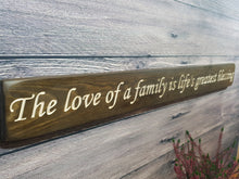 Load image into Gallery viewer, Wooden sign - Personalised Gifts - Long Wooden Signs- &quot;The Love Of A Family Is Life&#39;s Greatest Blessing&quot;