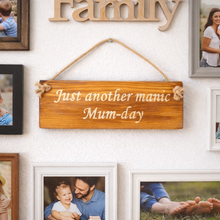 Load image into Gallery viewer, Wall with family photos and a humorous sign