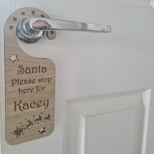 Wooden Personalised children's Christmas Santa stop here door hanger