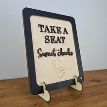 Load image into Gallery viewer, Wooden 3D Sign - TAKE A SEAT sweet cheeks - Gift - Wooden sign - comical gift - Bathroom sign -Wall Decor